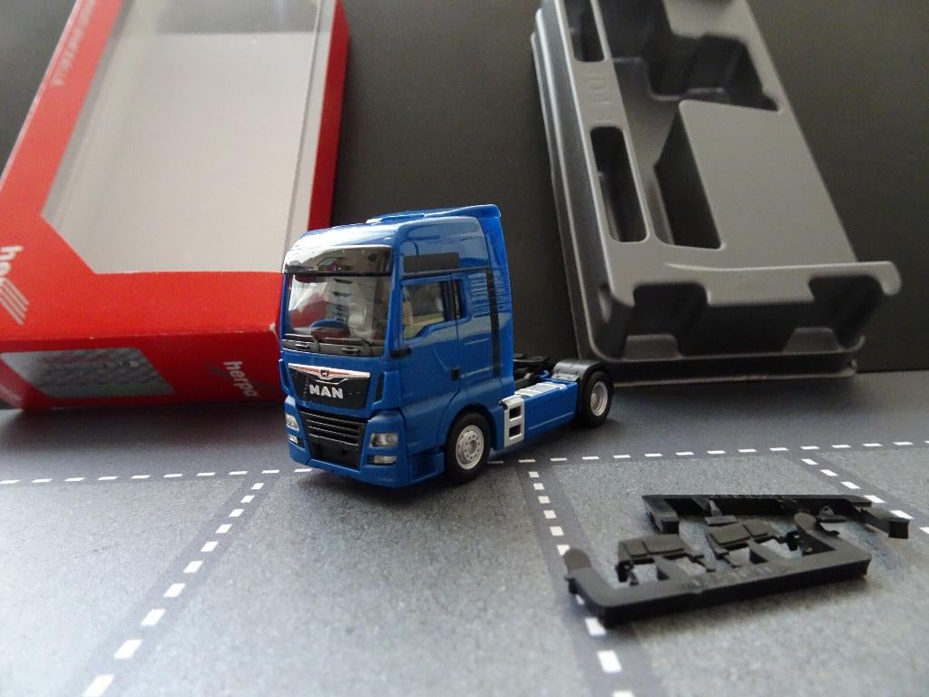 603 herpa 308328 man tgx xxl 6c 2-as trekker blauw 1:87 truc, Ophalen of Verzenden, Nieuw, Bus of Vrachtwagen, Herpa