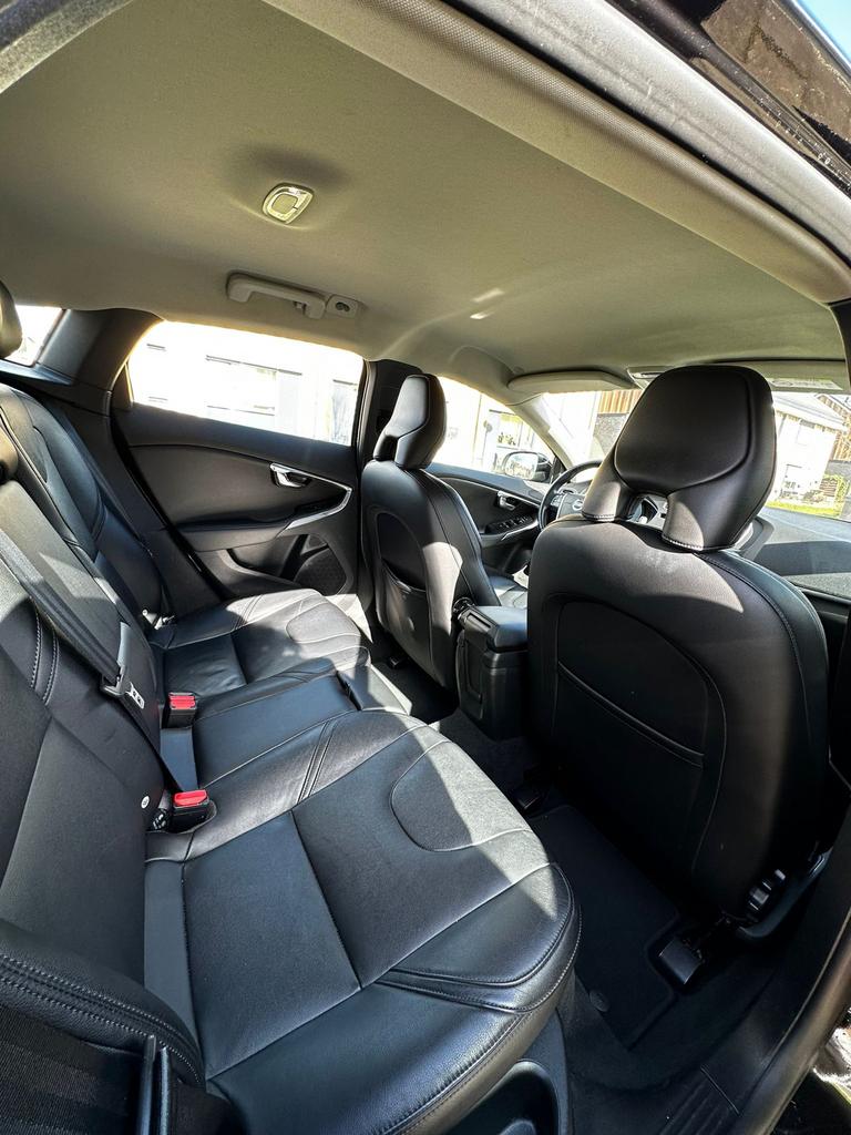 EXPORT | Volvo V40 2.0 D2 LEATHER/CLIM/NAVI/CRUISE/STOELVERW, Auto's, Voorwielaandrijving, Zwart, 4 cilinders, 1969 cc