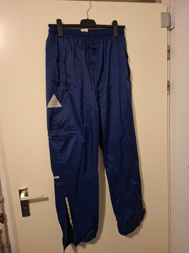 Blauwe regenbroek maat 52   een keer gedragen., Ophalen