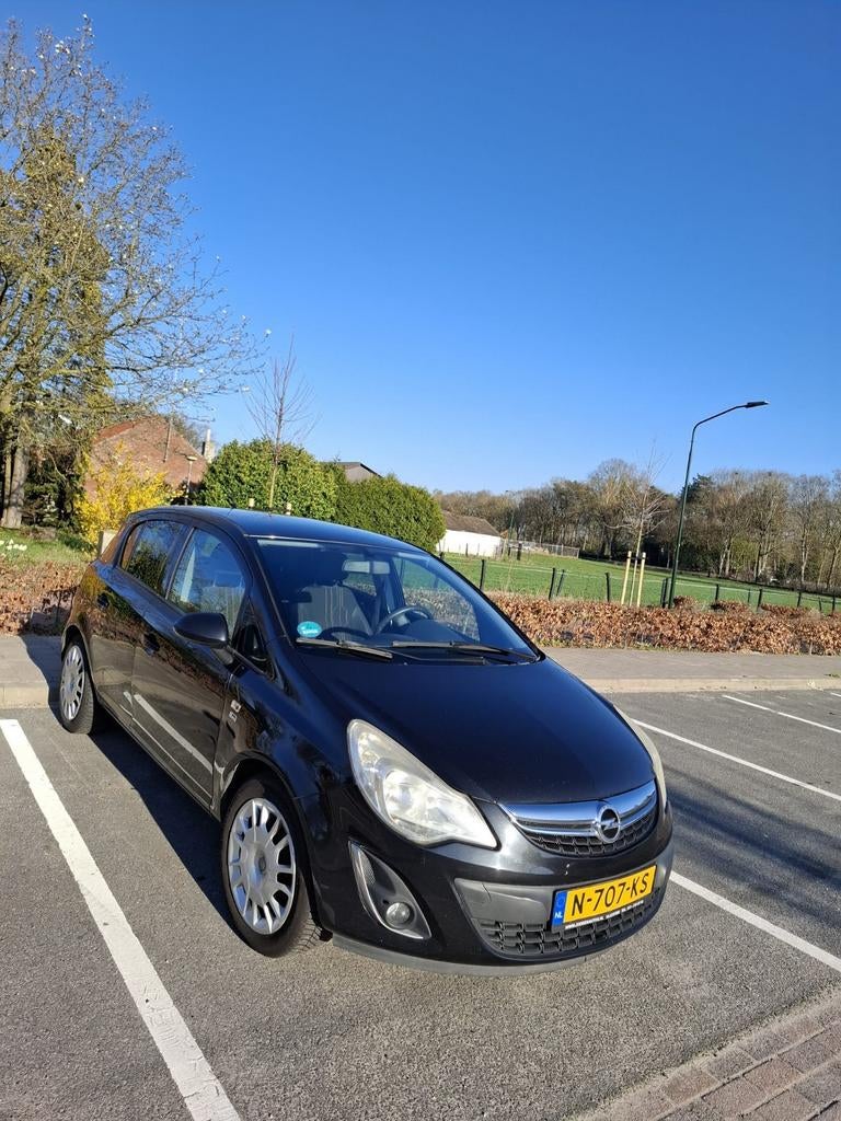 Opel Corsa 1.4 Ecotec 64KW 5D 2012 Zwart, Voorwielaandrijving, 1063 kg, 4 cilinders, Handgeschakeld