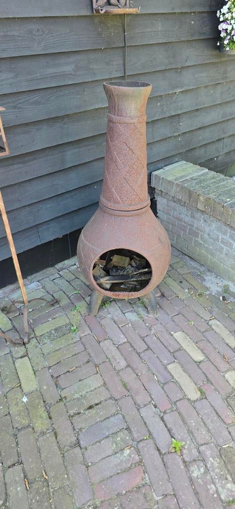 Terras Hout Kachel Gietijzer, Ophalen