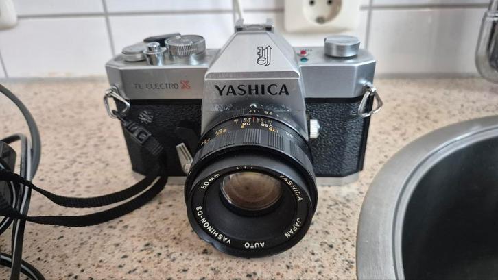 Yashica TL Electro X – analoge 35mm camera + accessoires + t, Audio, Tv en Foto, Fotocamera's Analoog, Zo goed als nieuw, Spiegelreflex