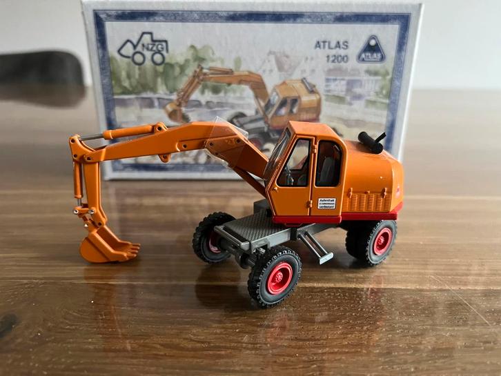Atlas 1200 mobiele graafmachine Maikäfer NZG 606 Nieuw, Hobby en Vrije tijd, Modelauto's | 1:50, Nieuw, Hijskraan, Tractor of Landbouw