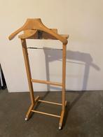 dressboy kledingstandaard, Ophalen