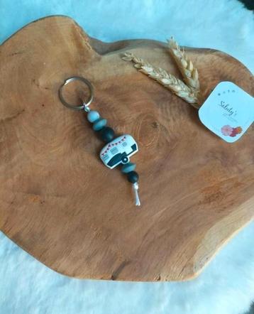 Nieuw, sleutelhanger Caravan  beschikbaar voor biedingen