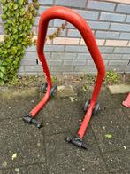 Paddockstand front, Motoren, Ophalen