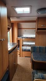 Caravan met stapelbed en vast bed te huur (langboekkorting)