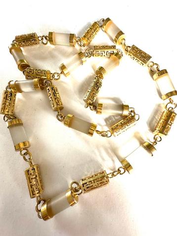 Vintage ketting met bergkristal kokers beschikbaar voor biedingen