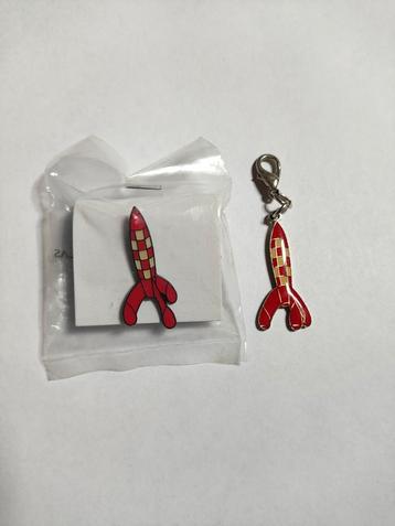 Mooie pin nieuw in verpakking en hanger van raket Kuifje beschikbaar voor biedingen