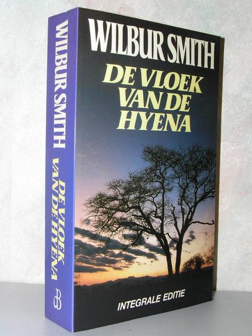 Wilbur Smith - De vloek van de hyena (integrale editie), Boeken, Romans, Zo goed als nieuw, Nederland, Ophalen of Verzenden
