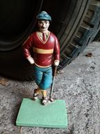 Vintage gietijzeren deurstopper. Golfer., Ophalen