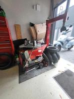 Butler superbike bandenapparaat, Ophalen