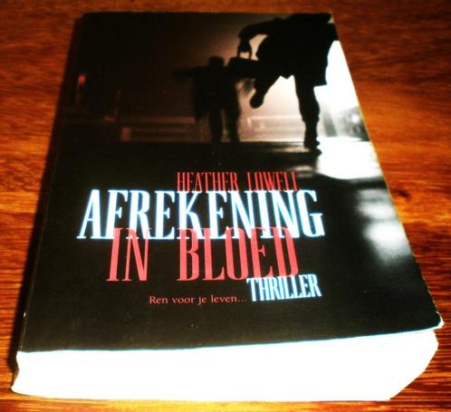 T.E.A.B. Heather Lowell.Afrekening In Bloed is zéér spannend, Boeken, Thrillers, Nederland, Ophalen of Verzenden