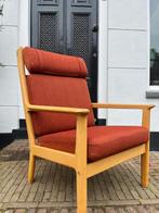 Fauteuil Hans J Wegner in roest/ rode kleur., Huis en Inrichting, Stoelen, Ophalen, Hout, Gebruikt, Retro stijl