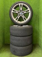 Originele 18 inch BMW 556M velgen winterbanden 1-serie f40, 18 inch, Gebruikt, Banden en Velgen, Ophalen of Verzenden