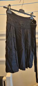 Kookaï - Zwarte rok tot de knie - zakken - lijntje knoop, Kookaï, Zwart, Ophalen of Verzenden, Knielengte