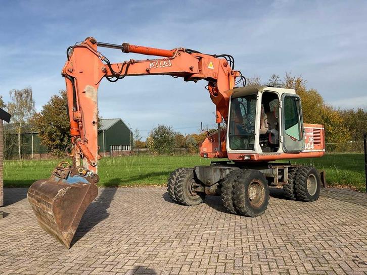 1996 Atlas 1404 Banden graafmachine, Zakelijke goederen, Machines en Bouw | Kranen en Graafmachines, Graafmachine