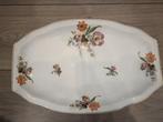 ovale porseleinen schaal met een bloemmotief., Antiek en Kunst, Antiek | Schalen, Ophalen of Verzenden