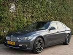 BMW 3-serie 320i Executive Modern Navigatie, Auto's, Automaat, Achterwielaandrijving, 4 cilinders, Leder en Stof