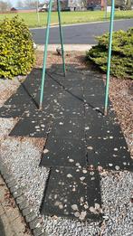 33 rubberen tegels., Ophalen