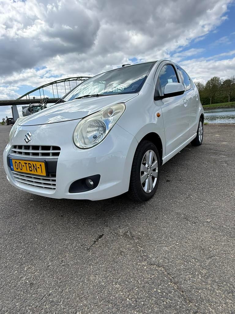 Suzuki Alto 1.0 2012 Wit 5 deurs airco electrische ramen, Auto's, Suzuki, Particulier, Alto, Benzine, B, Hatchback, Handgeschakeld
