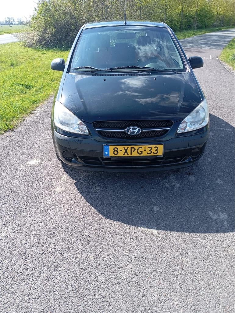 Hyundai Getz 1.1 3DRS 2008 Zwart, Auto's, Hyundai, Voorwielaandrijving, 31 €/maand, 4 cilinders, Zwart