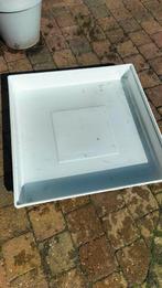 Wasmachine lekbak, Ophalen