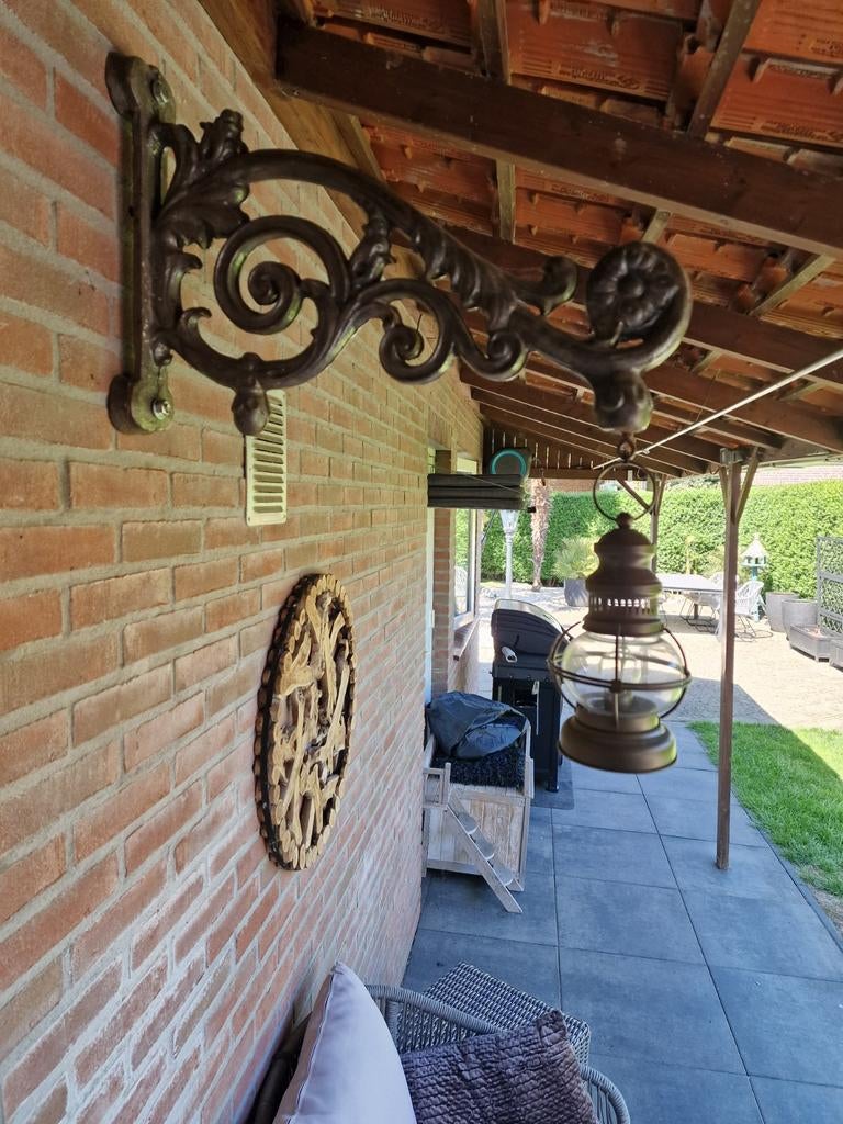 Gietijzer stang voor uithang bord, Ophalen