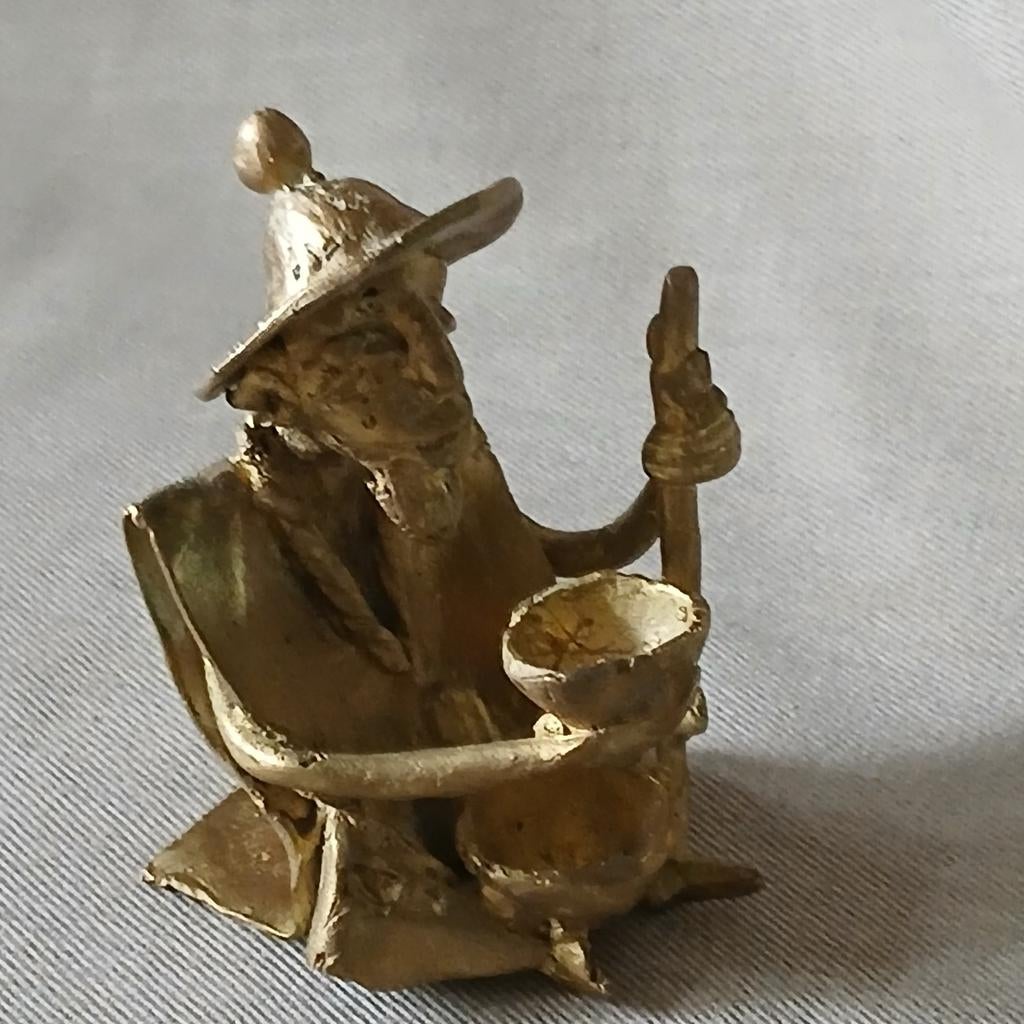 Bronzen beeldje, zittende man uit West Afrika, Antiek en Kunst, Ophalen of Verzenden