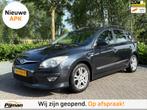 Hyundai I30 CW 1.4i i-Drive Cool/NL AUTO / AIRCO / TREKHAAK, Voorwielaandrijving, Euro 5, Stof, Gebruikt
