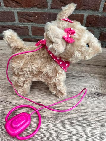Net echt, pluche, bewegende en blaffende puppy. beschikbaar voor biedingen