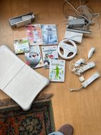 Nintendo Wii met spellen en balance board, Spelcomputers en Games, Spelcomputers | Nintendo Wii, Verzenden, Gebruikt, Met 2 controllers