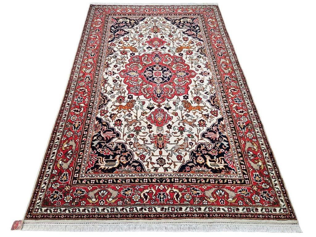 Handgeknoopt Perzisch wol Heriz tapijt Animals 168x270cm, Huis en Inrichting, Stoffering | Tapijten en Kleden, Zo goed als nieuw