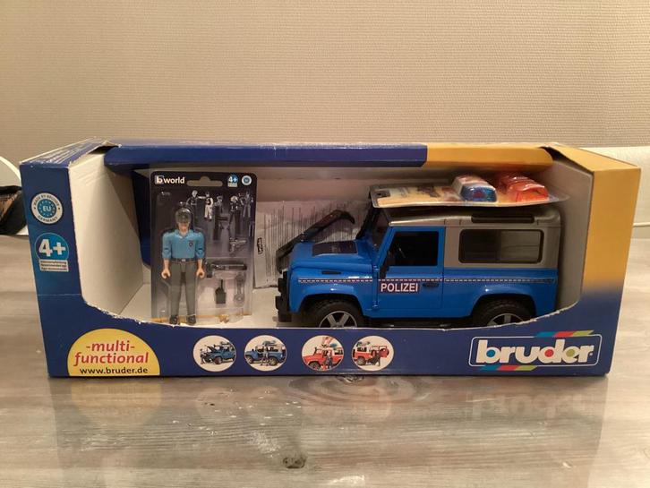 Bruder Land Rover Defender in politie uitvoering, Kinderen en Baby's, Speelgoed | Speelgoedvoertuigen, Nieuw, Ophalen of Verzenden