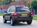 Kia Sportage 2.0 CVVT M-bition Cruise*Half leder*Trekhaak*St, Auto's, Kia, 1442 kg, 4 cilinders, Bruin, Leder en Stof