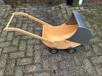 Houten poppenwagen, Ophalen, Gebruikt