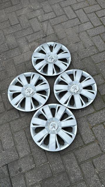 set peugeot wieldoppen 15 inch beschikbaar voor biedingen