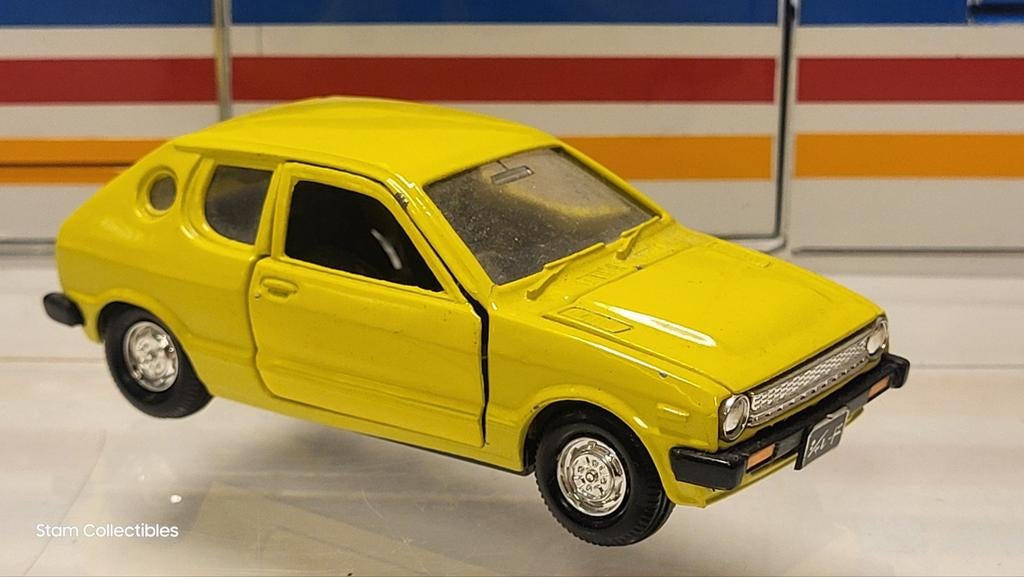 Diapet Yonezawa Daihatsu Charade Coupe XTE Yellow 1/35, Gebruikt, Auto, Ophalen of Verzenden