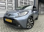 Toyota Aygo X 1.0 VVT-i Puls Automaat! NIEUWSTAAT!, Auto's, Stof, Gebruikt, 4 stoelen, 3 cilinders