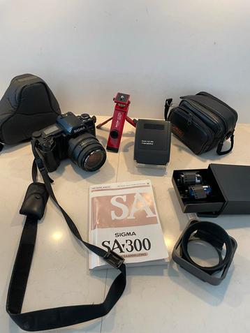 Sigma SA-300 Spiegelreflex Camera met Accessoires beschikbaar voor biedingen