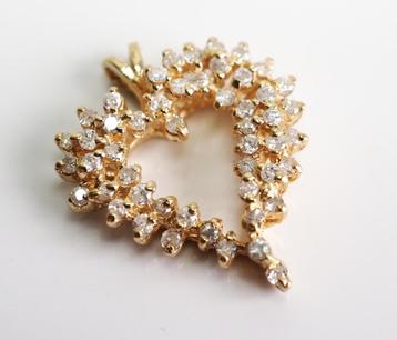 14 krt gouden hart-hanger bezet met diamant beschikbaar voor biedingen