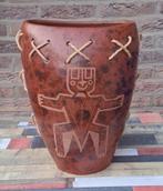 Handgemaakte aardewerk pot, Ophalen