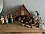 Kerststal met gipsen figuren, Ophalen