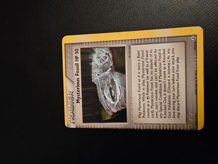 Mysterious Fossil HP 50 Misprint Error, Hobby en Vrije tijd, Verzamelkaartspellen | Pokémon, Zo goed als nieuw, Ophalen of Verzenden