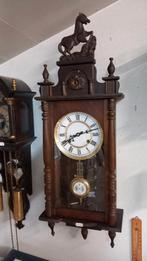 pendule klok met paardje, Ophalen