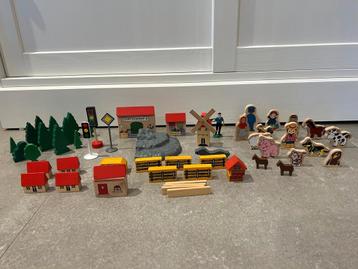 Figuren voor bij houten trein beschikbaar voor biedingen