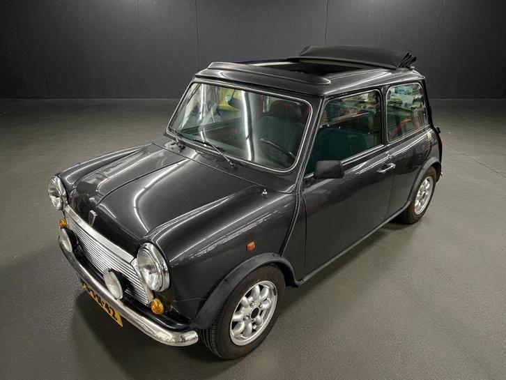 Rover Mini 1.3 I E2 1997 Zwart Balmoral Editie, Auto's, Rover, Bedrijf, Open dak, Benzine, Hatchback, Handgeschakeld, Origineel Nederlands