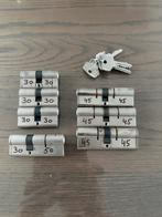 7 gelijksluitende cilinders merk DOM, Doe-het-zelf en Verbouw, Hang- en Sluitwerk, Ophalen of Verzenden, Zo goed als nieuw, IJzer