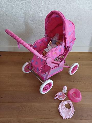 Poppenwagen, pop en verzorging set.    beschikbaar voor biedingen