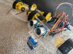 Robot car met obstacle sensor and extras, Hobby en Vrije tijd, Ophalen of Verzenden, Zo goed als nieuw